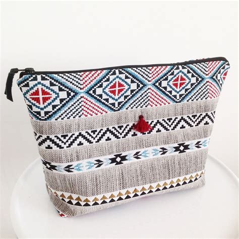 Trousse de toilette en jacquard enduit 